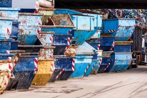 Fulham skip hire service in action with a large skip