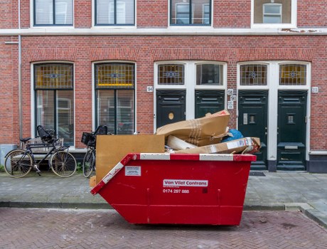 Builders removing construction waste in Fulham