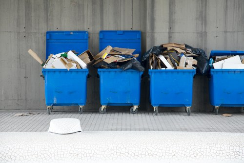 Construction site with proper waste disposal bins in Fulham