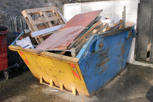 Small skip placed on a London street for property clearance