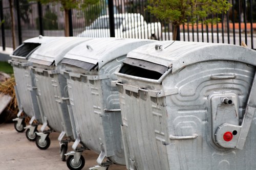 Different sizes of enclosed skips available for hire in Fulham